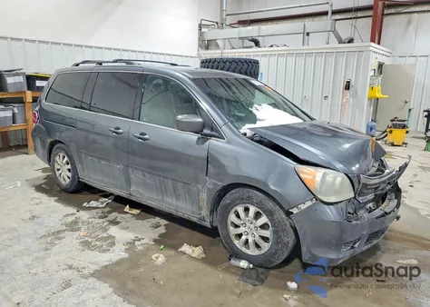 2010 Honda Odyssey Exl z USA, uszkodzony, nr VIN 5FNRL3H69AB064291
